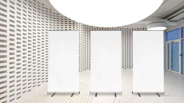 istock Blank roll up banner stand in contemporary office interior 1078166758