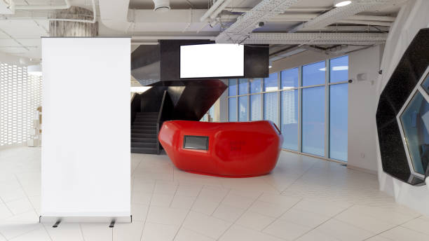 istock Blank roll up banner stand in contemporary office interior 1078166800