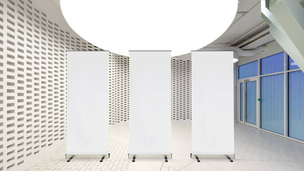 istock Blank roll up banner stand in contemporary office interior 1078167140