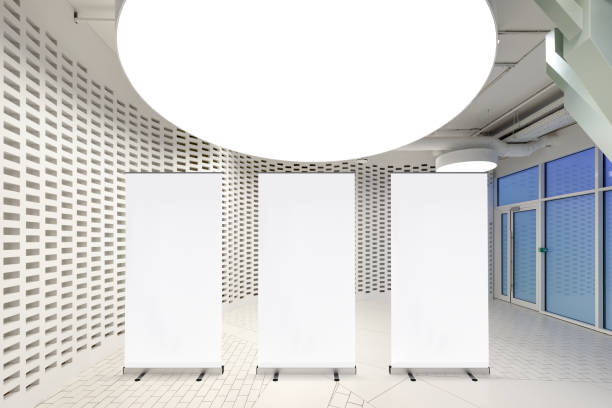 istock Blank roll up banner stand in contemporary office interior 1078167528