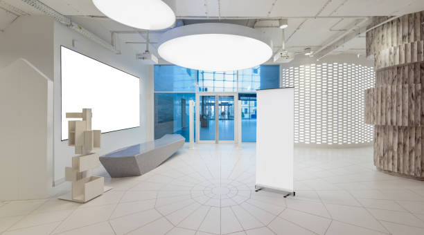 istock Blank roll up banner stand in contemporary office interior 1078167848