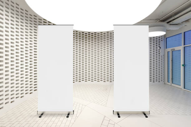 istock Blank roll up banner stand in contemporary office interior 1078168364