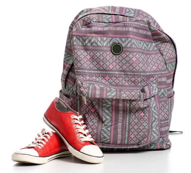 istock Female red sneakers and backpack 1078168384