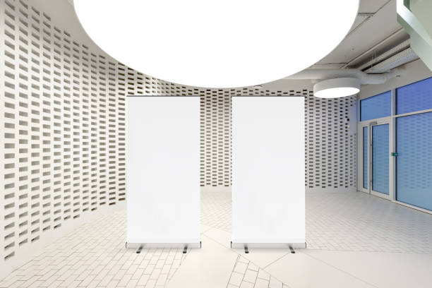 istock Blank roll up banner stand in contemporary office interior 1078168910