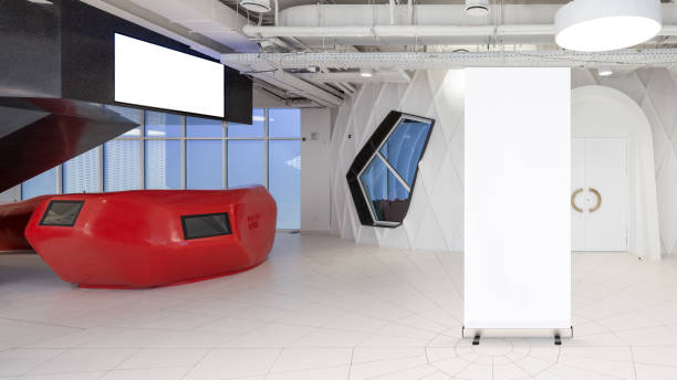 istock Blank roll up banner stand in contemporary office interior 1078169068