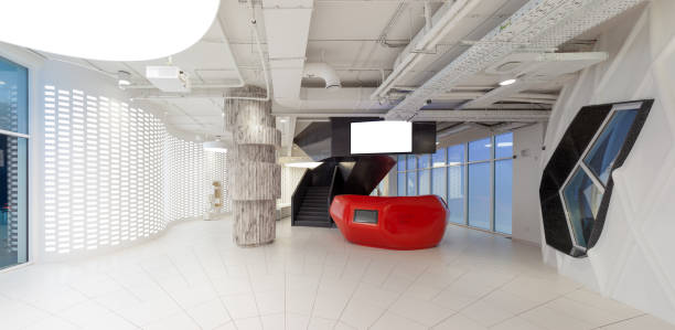 istock Blank roll up banner stand in contemporary office interior 1078169328