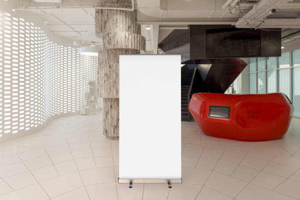 istock Blank roll up banner stand in contemporary office interior 1078169408