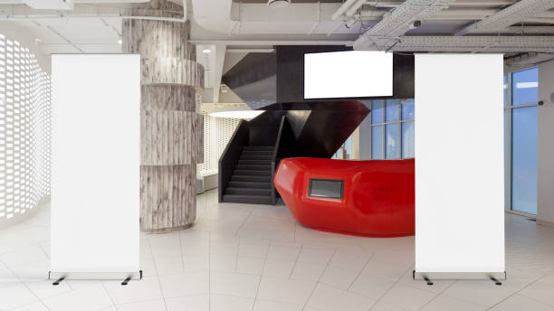 istock Blank roll up banner stand in contemporary office interior 1078169950