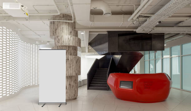 istock Blank roll up banner stand in contemporary office interior 1078169998