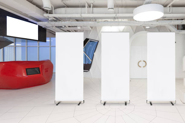 istock Blank roll up banner stand in contemporary office interior 1078170118