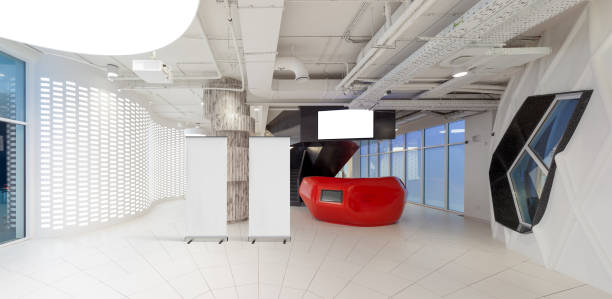 istock Blank roll up banner stand in contemporary office interior 1078171208
