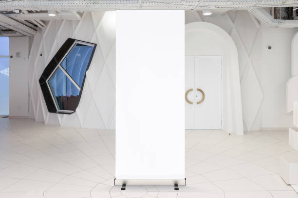 istock Blank roll up banner stand in contemporary office interior 1078171506