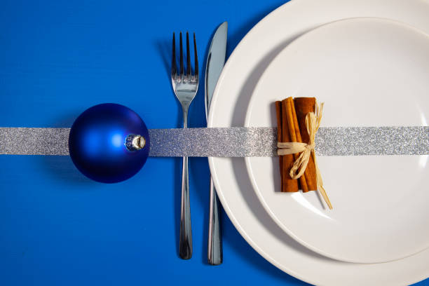 istock Two white plates and Christmas decoration 1078172148