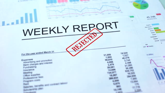 Weekly report rejected, hand stamping seal on official document, statistics