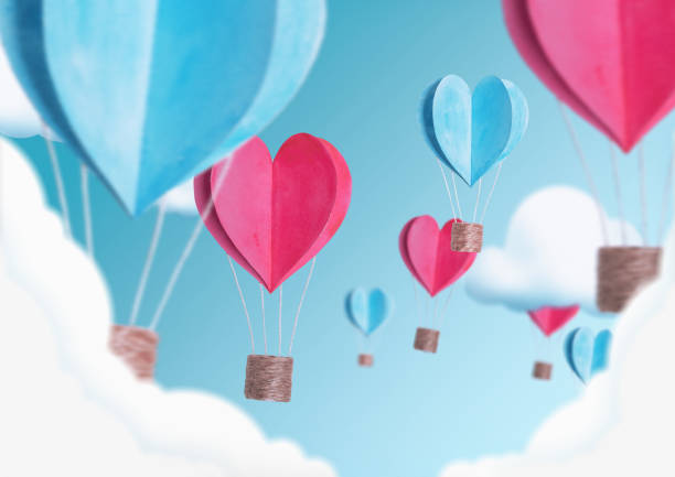 illustration of balloons in the shape of hearts flying in the sky.