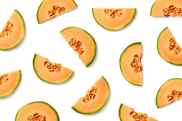Fruit pattern of melon slices Fruit pattern of melon slices isolated on white background. Top view. Flat lay melon photos stock pictures, royalty-free photos & images