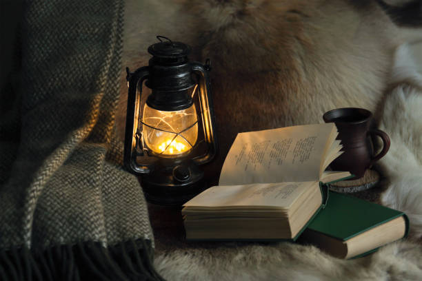 istock still life with lamp, book, plaid, cup of tea 1078183256