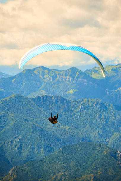 istock Paragliding over lake garda 1078183772