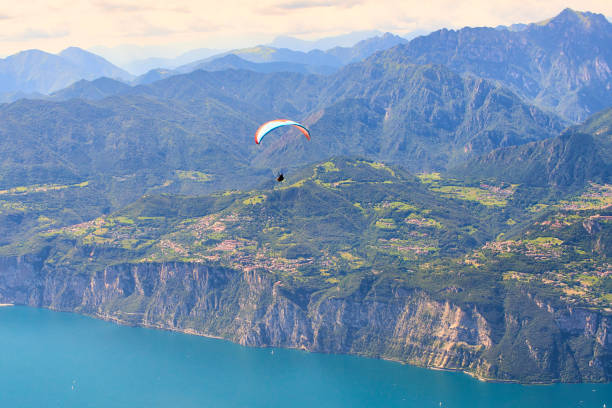 istock Paragliding over lake garda 1078183980