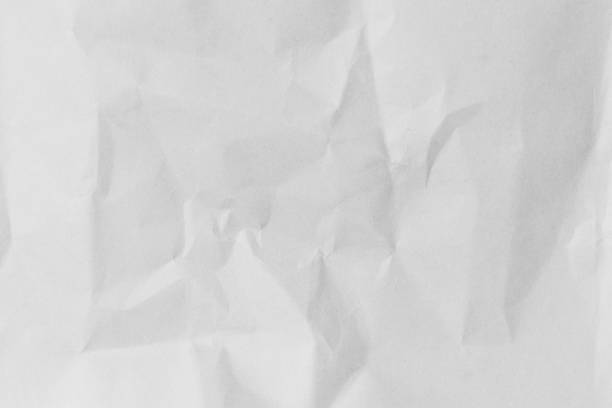 old crumpled white color paper horizontal background texture concept for design