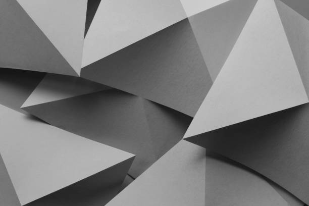 istock Composition with gray paper folded in geometric shapes 1078185932