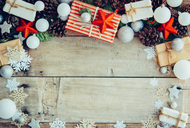 istock Christmas background with gift boxes and decorations on the wood 1078201716