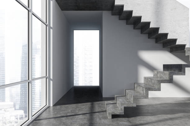 istock Stairs in empty room with windows 1078202204