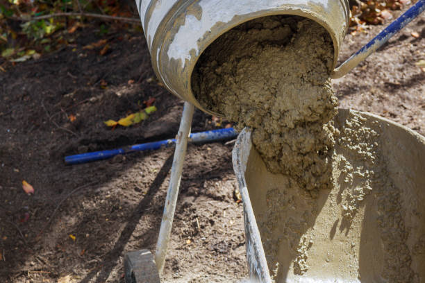 istock An concrete mixer poured the finished solution into a bucket 1078212766