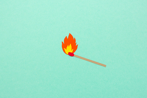 Paper cut match with flame illustration