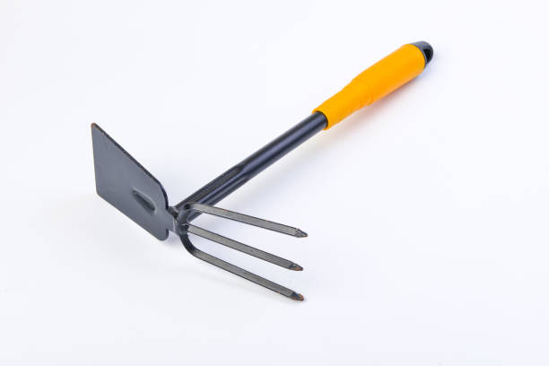 istock Gardening shovel and fork isolated . 1078215192