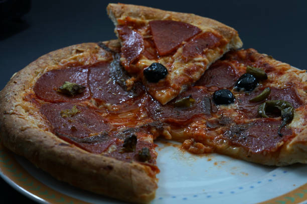 istock Pizza is a spicy bread sandwich made from simple yeast dough 1078217934