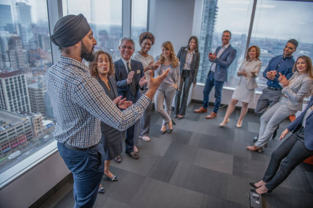 istock Businessman giving a speech to colleagues 1078218966