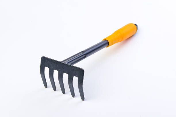 istock Gardening shovel and fork isolated . 1078219156
