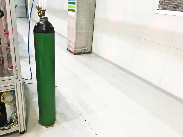 Safety Hazard: A loose green gigantic gas/liquid cylinder stock photo