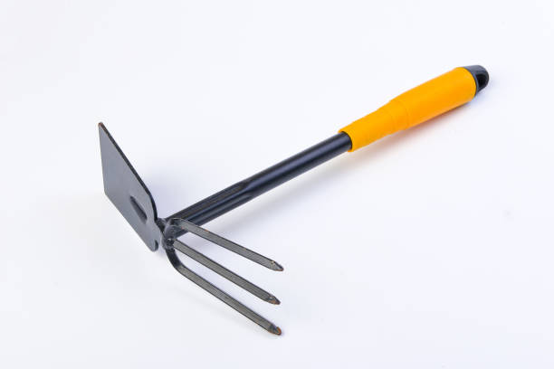 istock Gardening shovel and fork isolated . 1078221598