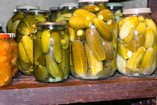 istock Glass jar with pickled cucumbers in grandma basement 1078232010