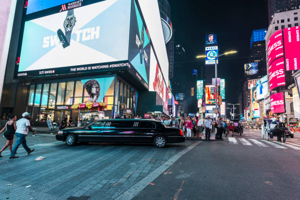 times square at night in new york city, usa - street furniture traffic lighting equipment urban scene imagens e fotografias de stock