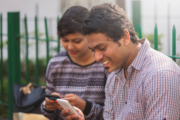 istock Young people in India using mobile phone 1078241334