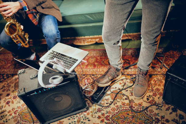 istock Musicians having rehearsal in home studio. 1078243834