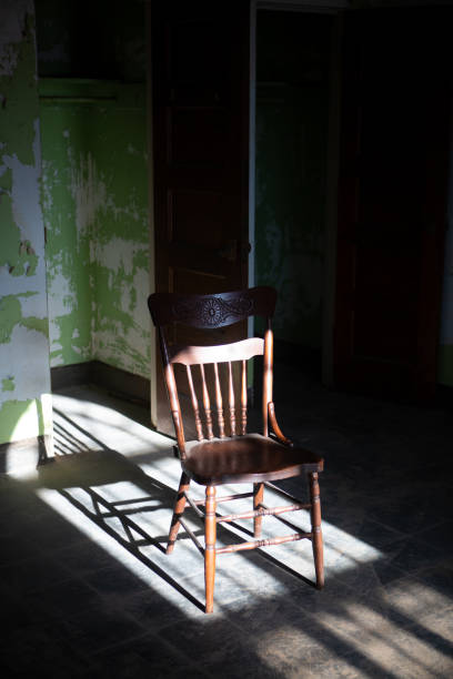 istock old wooden chair in the sunlight 1078244066