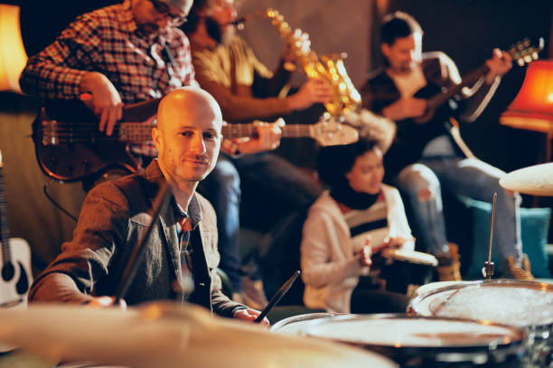 istock Jazz band playing music in home studio. 1078246184