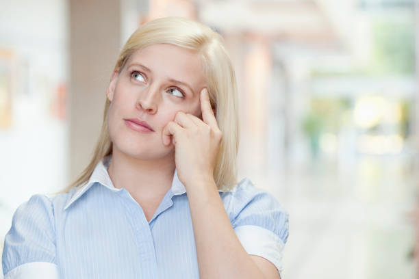 istock Woman thinking in office 1078253988