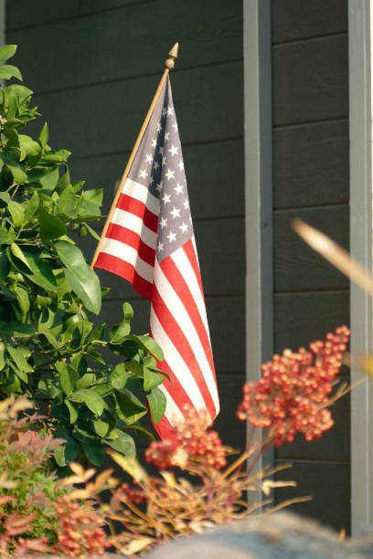 istock American Flag on Porch 1078254790