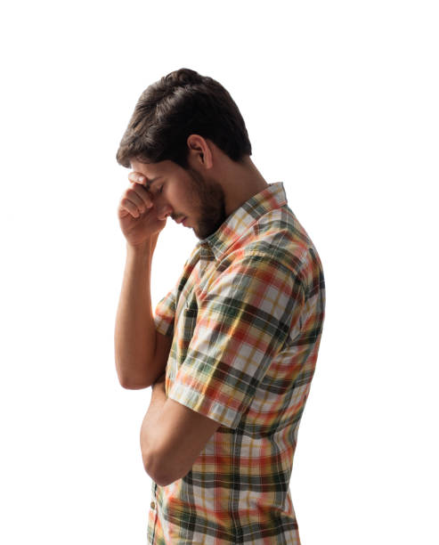 istock Side view of young latin man bowing head and closing eyes 1078258364
