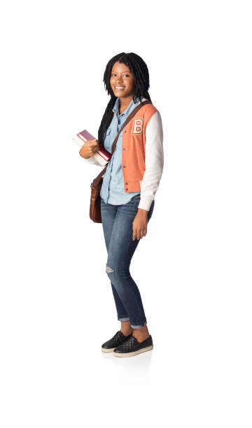 istock Young university female student standing with bag and books 1078258402