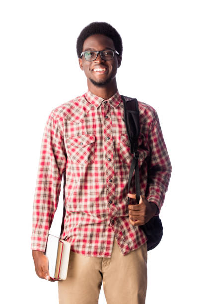 istock Young black male student with books smilign at camera 1078258476