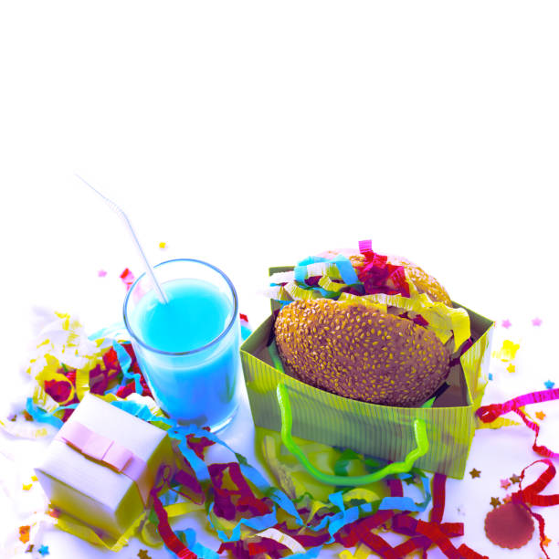 Surrealism Festive composition drinks snacks holiday hamburger cookie tinsel confetti gift box cocktail saturated colors.
