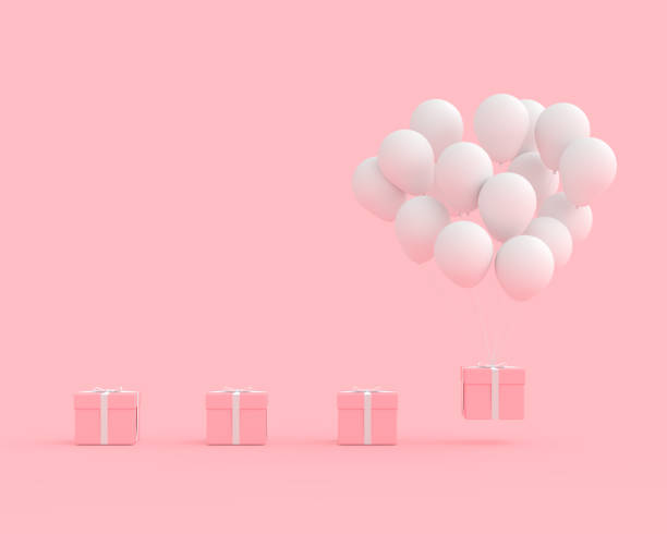 istock Pink gift box with balloon white color on pink background 1078285476