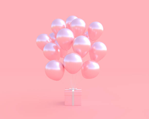 istock Pink gift box with balloon on pink background 1078285482