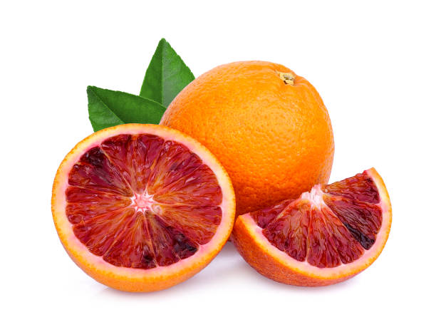 istock whole and slices blood orange with green leaf isolated on white background 1078287838